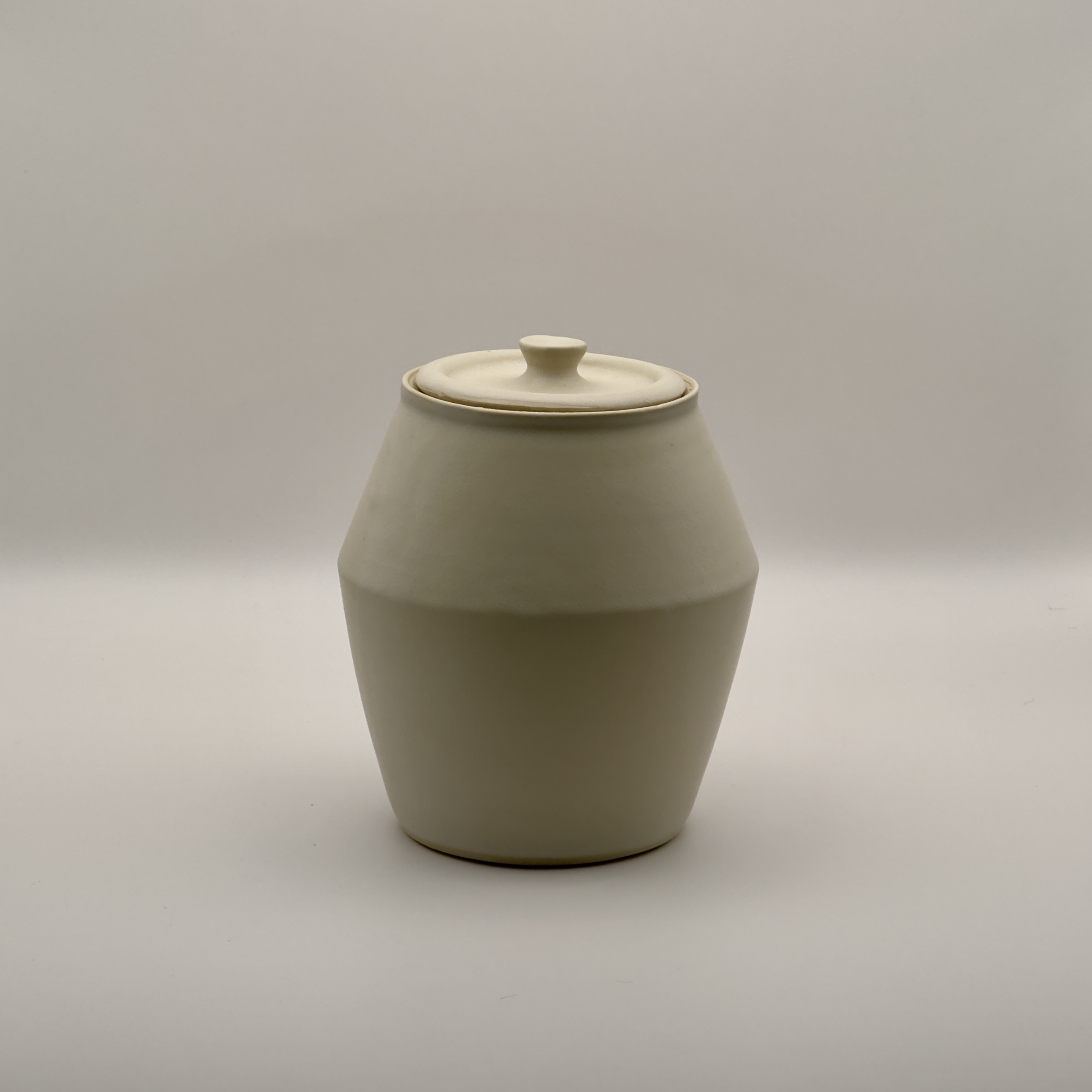 Cream lidded storage jar